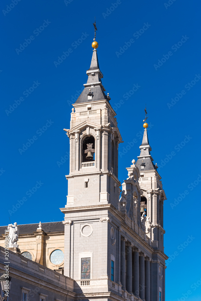 MADRID, SPAIN - SEPTEMBER 26, 2017: Cathedral Almudena on the blue sky backgroun. Copy space for text. Vertical.