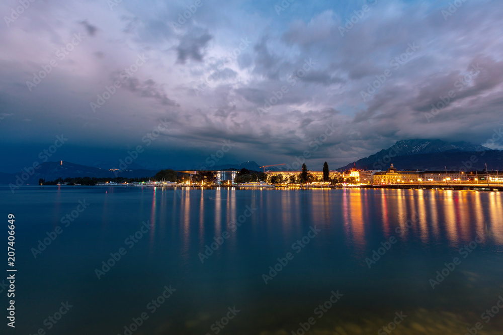 Mountain lake in the Alps at night. Lucerne at night.