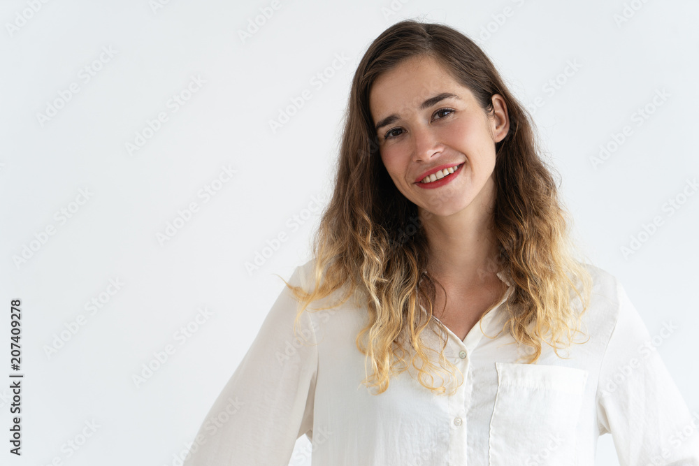 Smiling beautiful young woman looking at camera. Woman portrait concept. Isolated front view on white background. Smiling beautiful young woman looking at camera. Woman portrait concept. Isolated front view on white background.