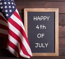 HAPPY 4th OF JULY Sign and the American Flag