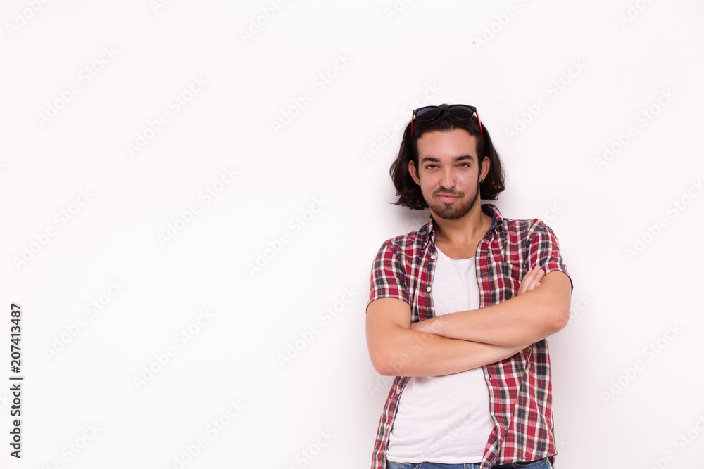 Handsome bearded man in casual clothes, looking at camera . Handsome bearded man in casual clothes, looking at camera .