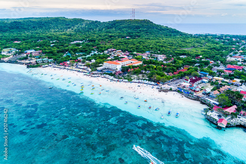 Vászonkép Aerial View of Tanjung Bira Beach, Sandy Beach with Tourists Swimming in Beautif