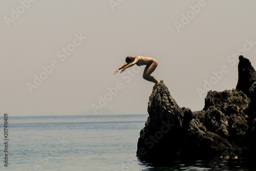 woman jumps to the sea