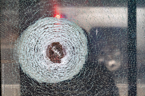 broken bulletproof glass close up photo