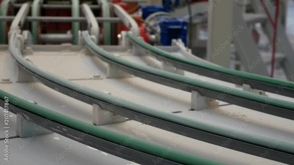 Factory for the Production of Ceramic Modern Tiles on Conveyor Belt. Conveyor Line With Ceramic Tile At Modern Heavy Plant Factory for the Production of Ceramic Modern Tiles on Conveyor Belt. Conveyor Line With Ceramic Tile At Modern Heavy Plant