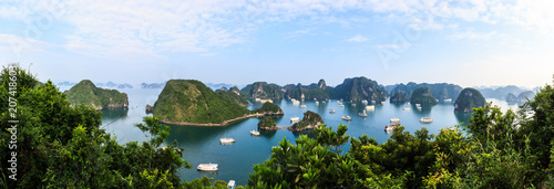 Panoramic view of Ha Long Bay islands, tourist boat and seascape, Ha Long, Vietnam.
