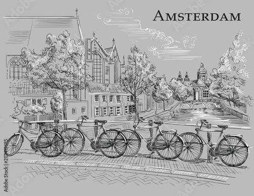 Bicycles on bridge in Amsterdam, grey