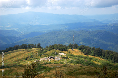 ruins of old concrete building on a background mountains on a foreground