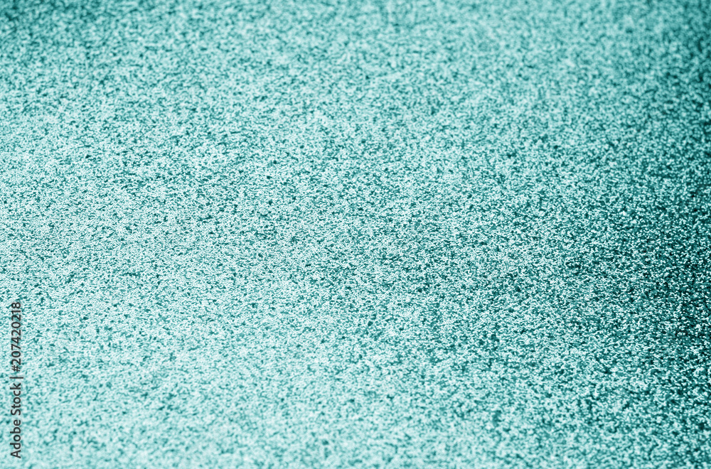 Glittering background in cyan color with blur effect. Glittering background in cyan color with blur effect.