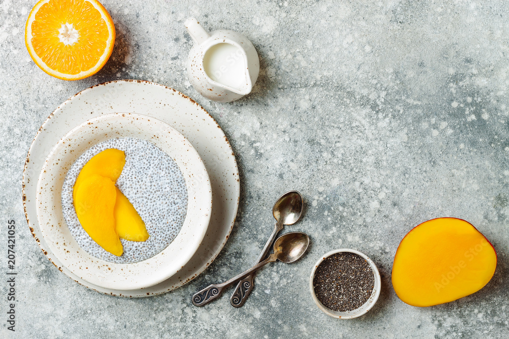 Healthy breakfast set. Chia seed pudding bowls with mango. Healthy breakfast set. Chia seed pudding bowls with mango.