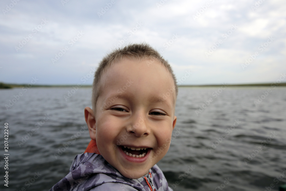 Cute smiling little boy outdoors Cute smiling little boy outdoors