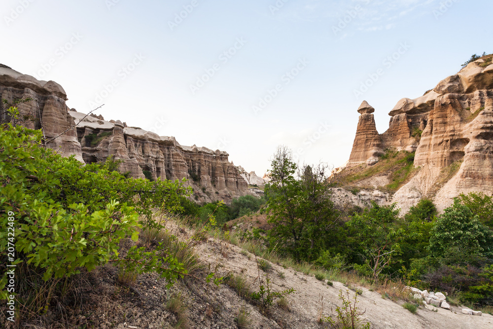 old rocks in ravine near Goreme town in Cappadocia