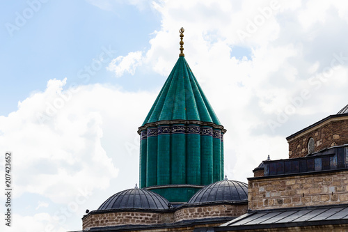 green dome and roof of Rumi Shrine in Konya city photo