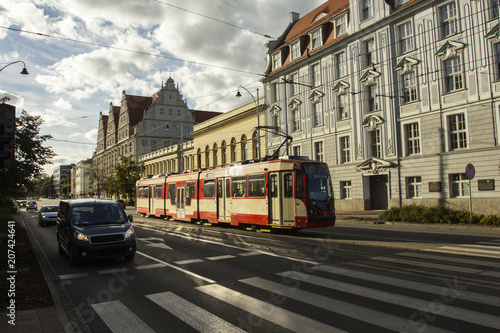 A public transport tram rides along the Gdansk street. Poland