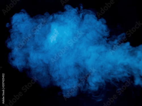 Obraz na płótnie Abstract blue smoke on a dark background w salonie