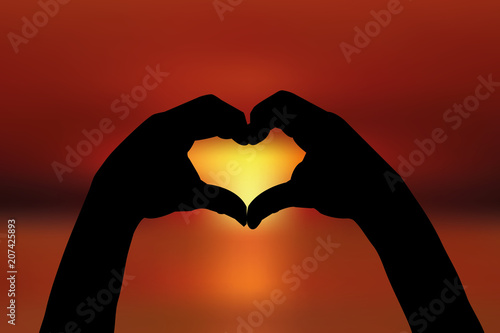 Herz Hand vor Sonnenuntergang