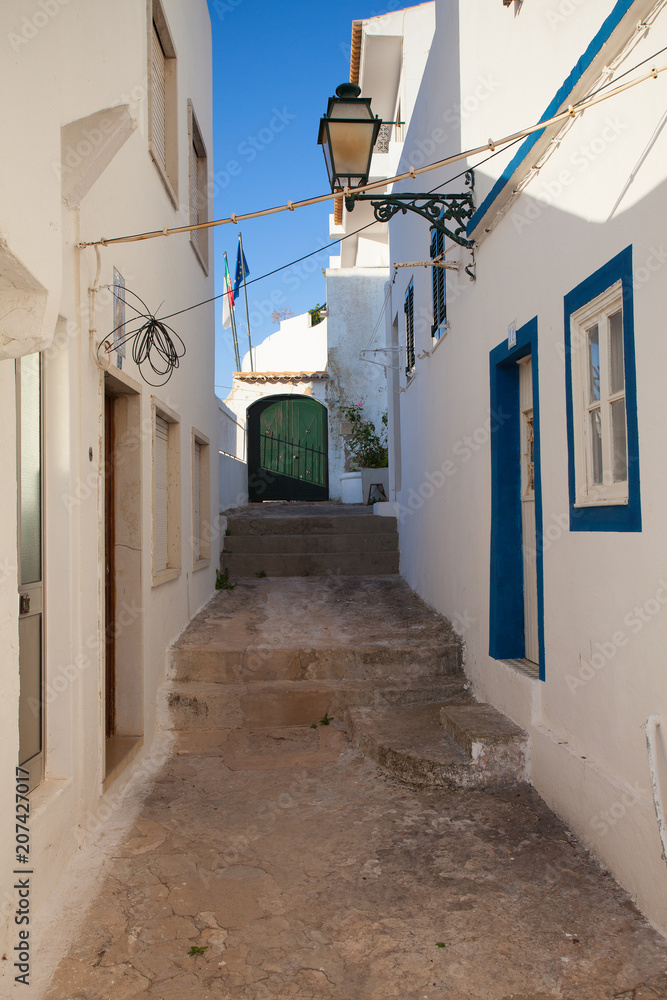 Fototapeta premium Empty street at sunset in Albufeira