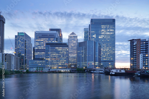 Canary Wharf in London  cityscape on a cloudy evening.
