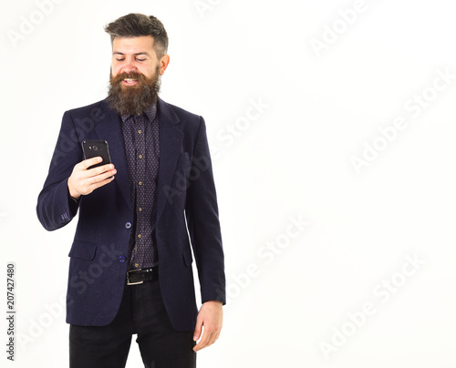Hipster with long beard and smiling face.