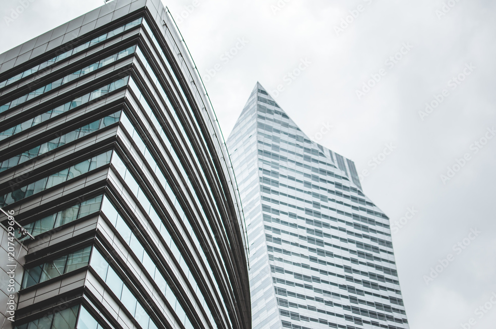 Moden business offices in Warsaw, Poland. Cloudy grey skies Moden business offices in Warsaw, Poland. Cloudy grey skies