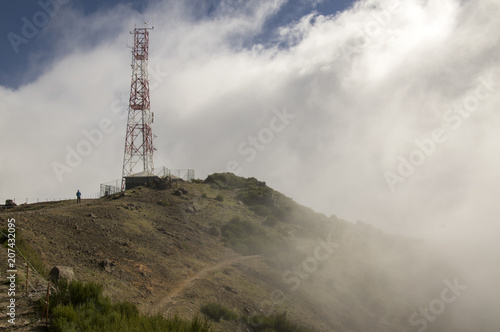 Pico do Arieiro hiking trail, amazing magic landscape with incredible views, rocks and mist, high transmitter station