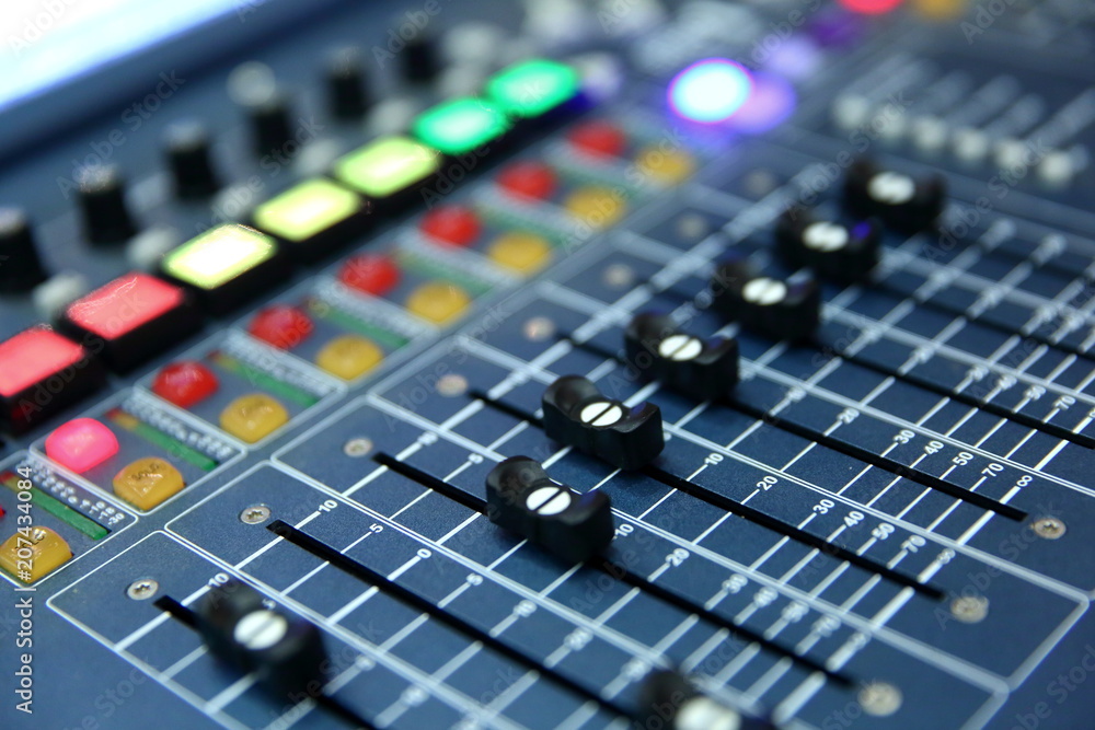 A professional music console called an audio mixer used to publicize concerts and other music events.
A professional music console called an audio mixer used to publicize concerts and other music events.