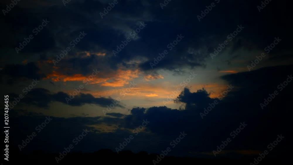 Beautiful sunset with clouds of different colors. The dark end of the day. Beautiful sunset with clouds of different colors. The dark end of the day.