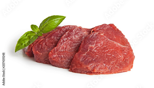 Beef slices with basil, isolated on white background.