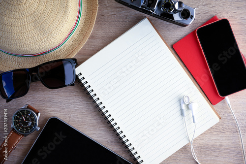 Equipment to visit the country. Red passport, camera, watch, hat, glasses