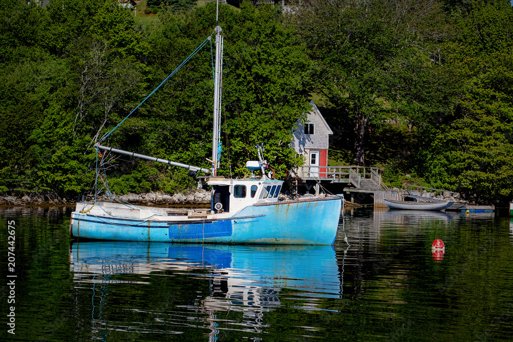 Fishing boat in the shallows along the Nova Scotia coastline.