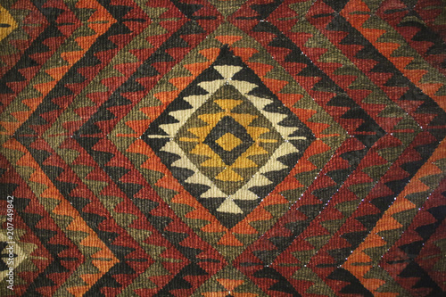 Texture of bedouin traditional wool carpet with geometric pattern,Jordan photo