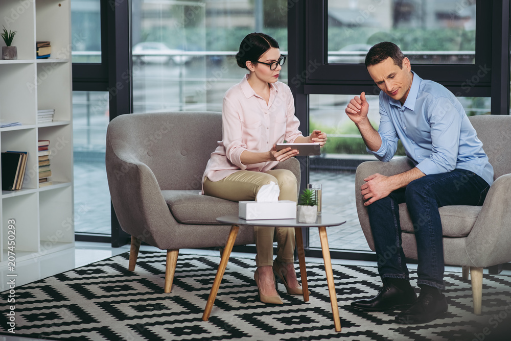 psychologist talking with businessman psychologist talking with businessman