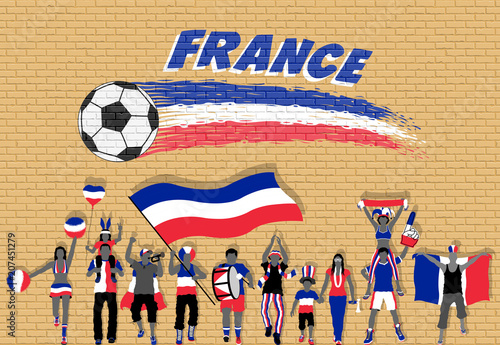 French football fans cheering with France flag colors in front of soccer ball graffiti