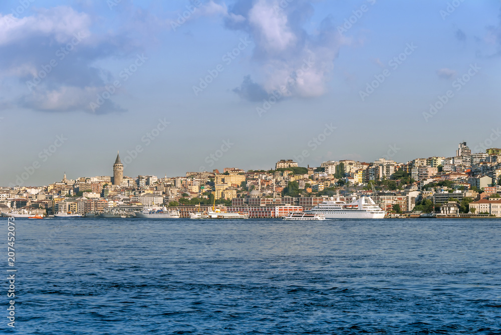 Istanbul, Turkey, 30 July 2007: The Galata Tower and ships in the Karakoy district of Istanbul.