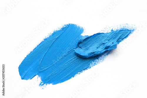 Abstract blue paint sample isolated on white background. Brush stroke texture.