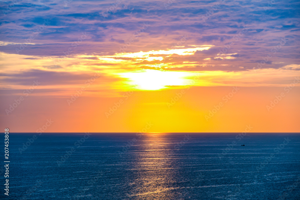 panorama view of blue sea with sunset