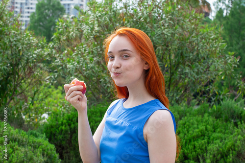 a girl with an apple