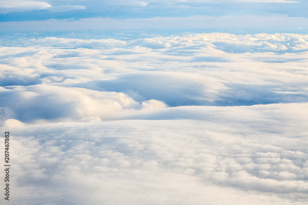 The white clouds background and texture. Cloud in the sky. Cloudscape with Sky and Clouds Background The white clouds background and texture. Cloud in the sky. Cloudscape with Sky and Clouds Background