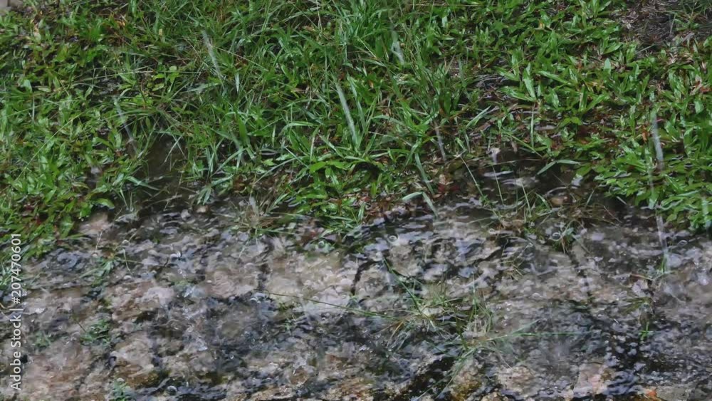 Raining on the ground with water splash. Raining on the ground with water splash.