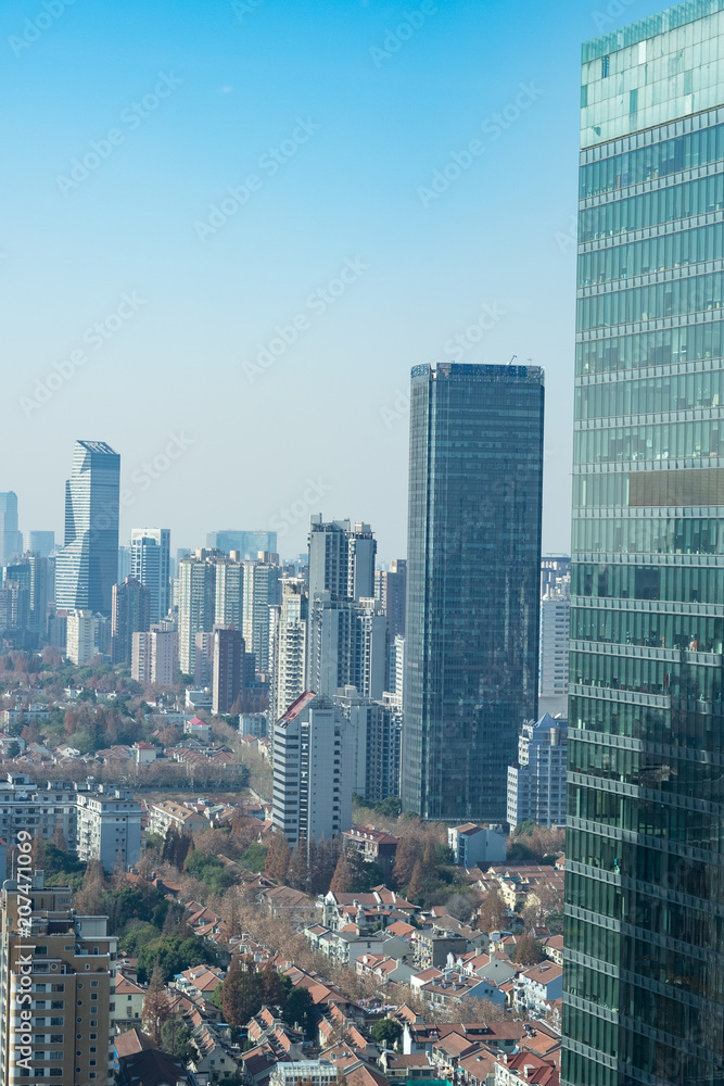 Residential buildings amongst sky scrapers - Shanghai