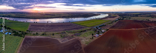 Bundaberg, Queensland / Australia - August 2016 - Aerial Panorama of Sugar Cane lining the Burnett River around Kalkie, Bundaberg photo