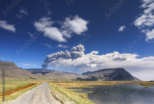 Volcano ash eruption. / Volcanic landscape with eyjafjallajokull glacier in Iceland photo