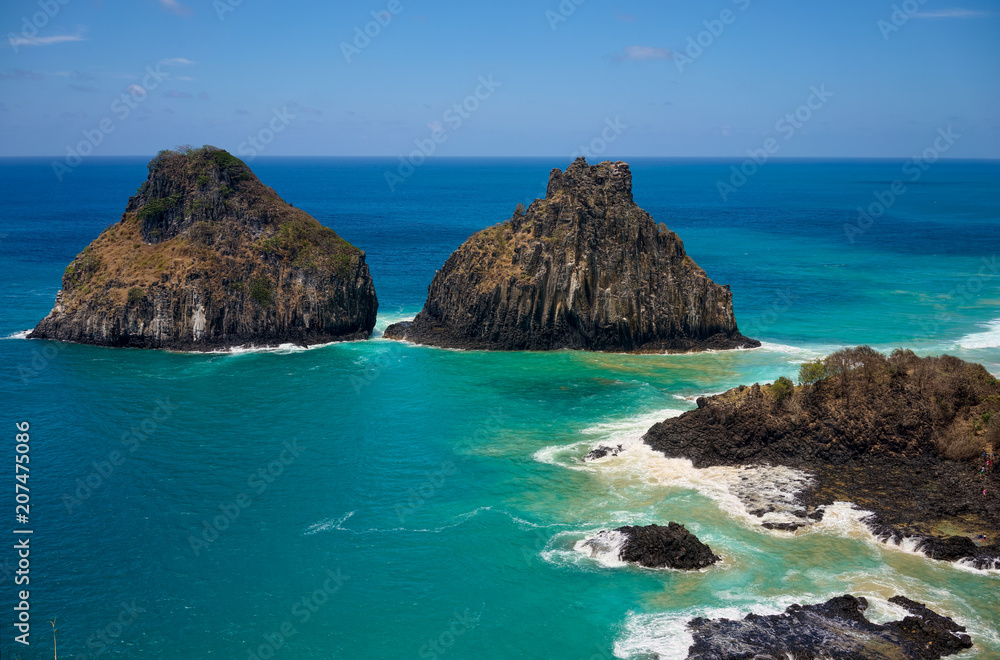 The Two Brothers Hill seen from the viewpoint at Sancho's Beach, Island of Fernando de Noronha, Pernambuco, Brazil The Two Brothers Hill seen from the viewpoint at Sancho's Beach, Island of Fernando de Noronha, Pernambuco, Brazil