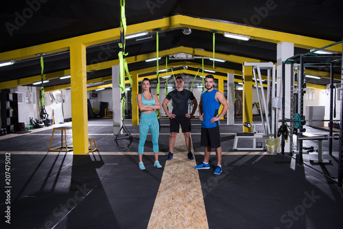 portrait of athletes at cross fitness gym