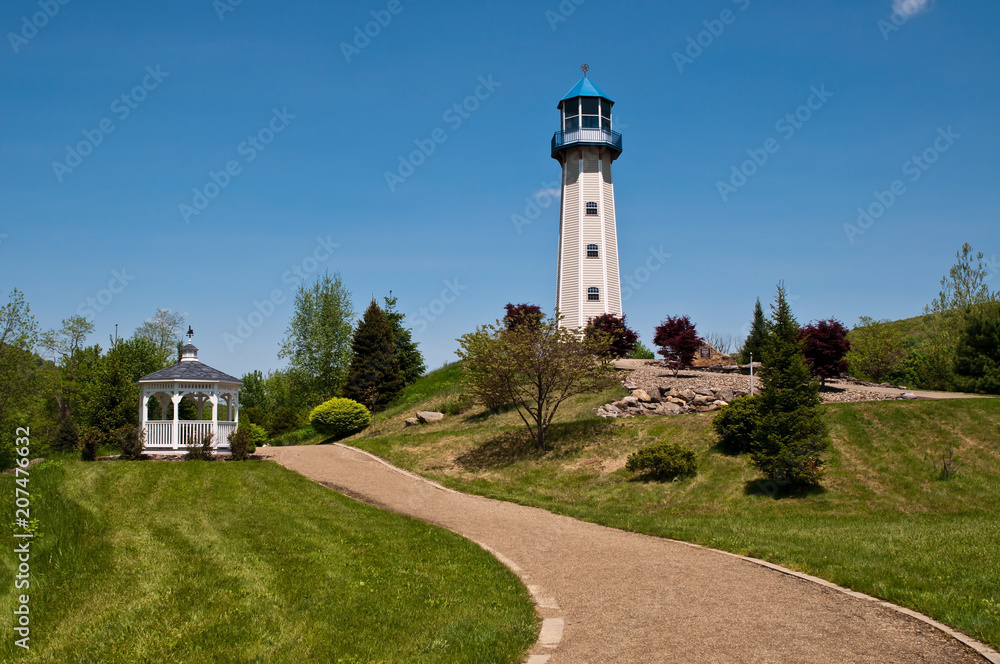 A lighthouse and gazebo in a park in Tionesta, Pennsylvania