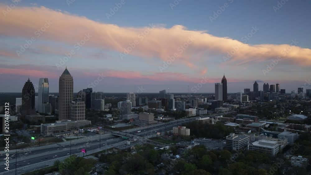 Elevated view over Interstate 85 passing the Midtown and Downtown Atlanta skyline, Georgia, United States of America Elevated view over Interstate 85 passing the Midtown and Downtown Atlanta skyline, Georgia, United States of America