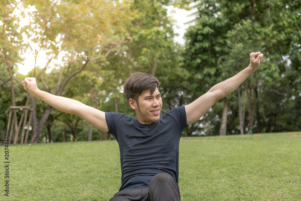 Fitness man have rest after training in park. Fitness man have rest after training in park.