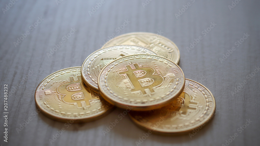 Bitcoin on the wood background. Bitcoin on the wood background.
