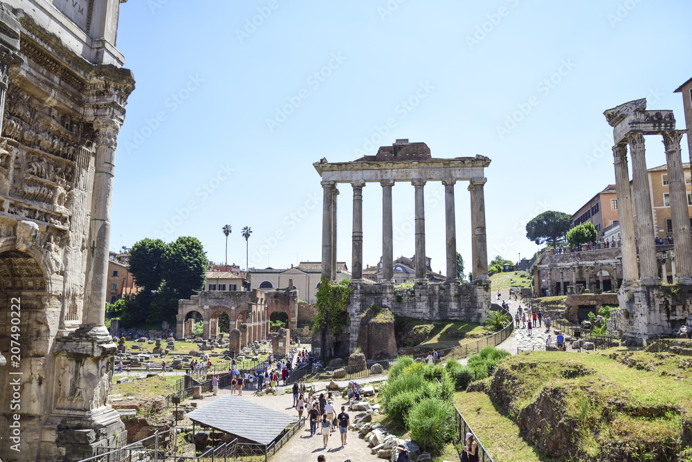 Rome,  ruins of the Imperial forums of ancient Rome. Arch of Septimius Severus and Temple of Saturn