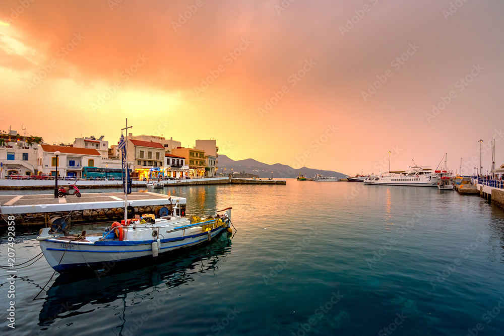 Agios Nikolaos,  a picturesque coastal town with colorful buildings around the port in the eastern part of the island Crete, Greece
